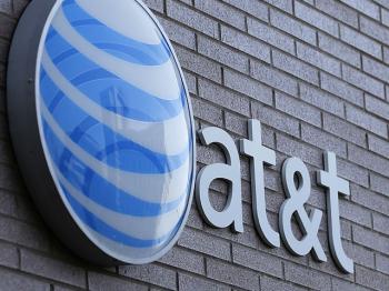 Newsline Report - Negocios - AT&T avanza en la compra de DirecTV